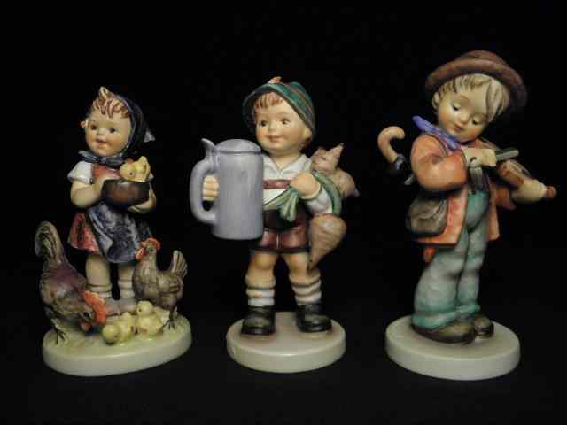 Appraisal: Three Hummel porcelain figurines Includes ''For Father'' ''Feeding Time'' and