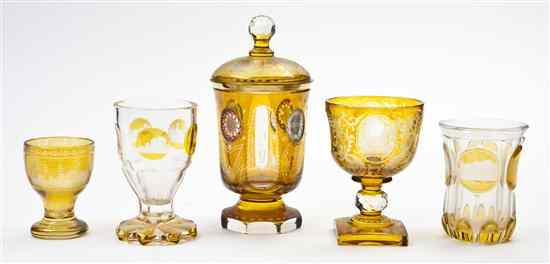 Appraisal: A Collection of Five Bohemian Amber Glass Articles comprising a