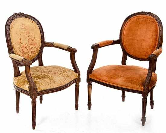 Appraisal: Louis XVI style carved fruitwood armchairs late th century reed-and-ribbon