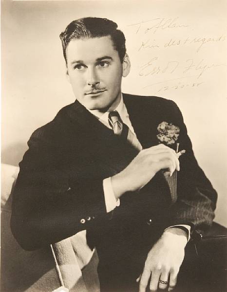 Appraisal: An Errol Flynn black and white signed photograph A vintage