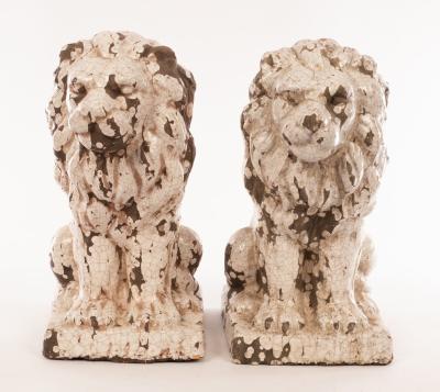 Appraisal: A pair of modern glazed terracotta lions with craquelure effect