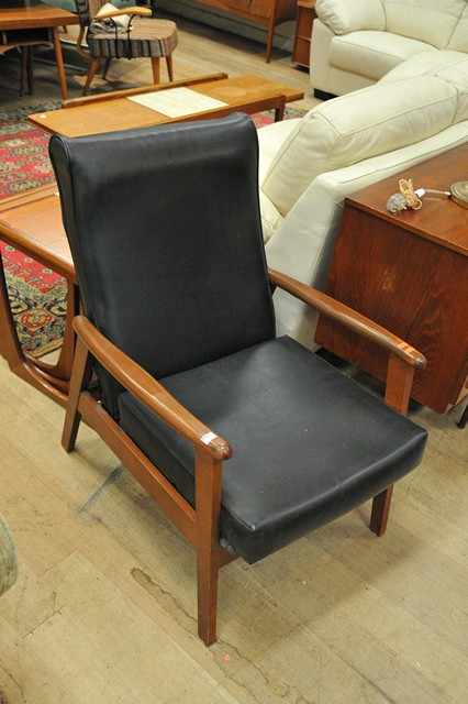 Appraisal: A 'S BLACK VINYL ARMCHAIR