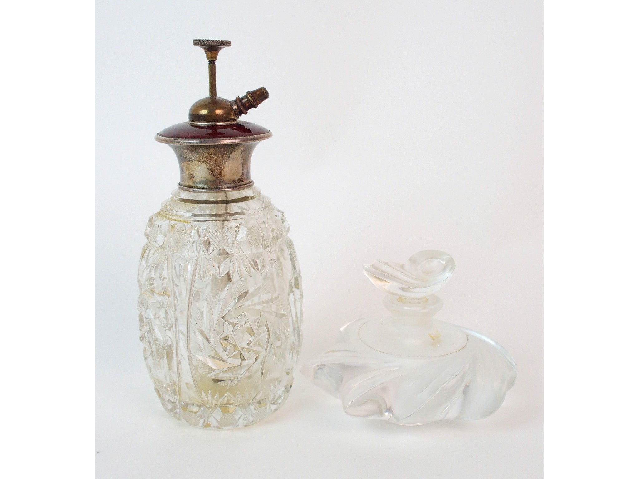 Appraisal: A Lalique moulded glass Samoa perfume bottle and a cut