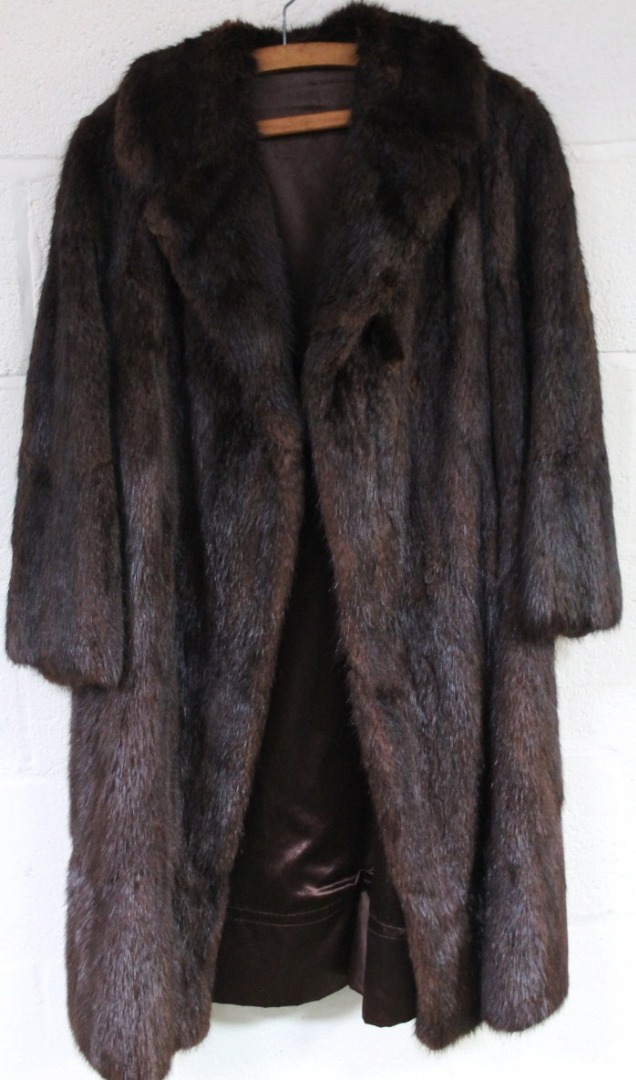 Appraisal: A ladies dark fur coat three quarter length