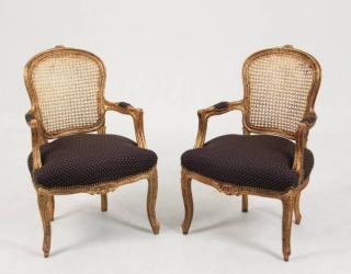 Appraisal: PAIR OF LOUIS XV STYLE CARVED GOLD GILT FAUTEUILS WITH