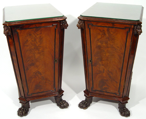 Appraisal: Pair of Regency mahogany pedestal wine coolers the canted tops