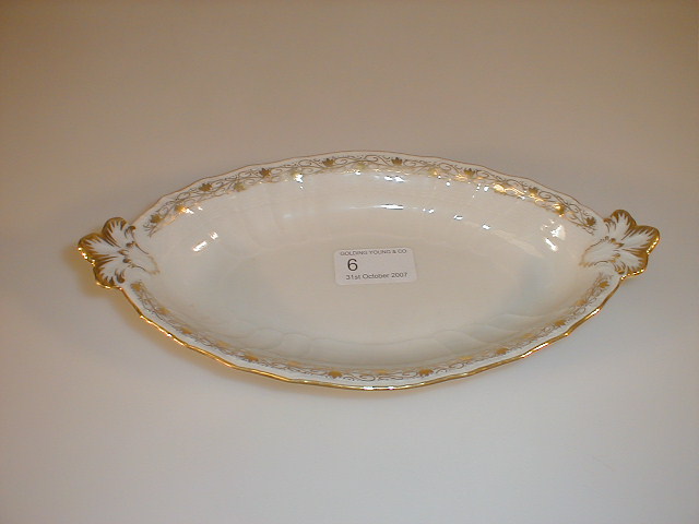 Appraisal: A Berlin porcelain navette shaped dish with gilt leaf moulded