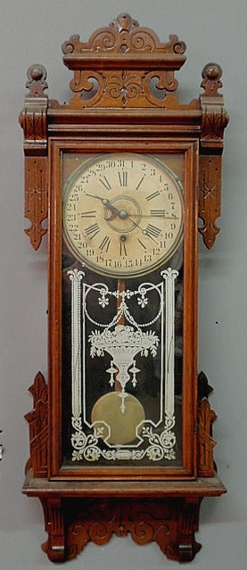 Appraisal: Carved oak cased calendar wall clock late th c h