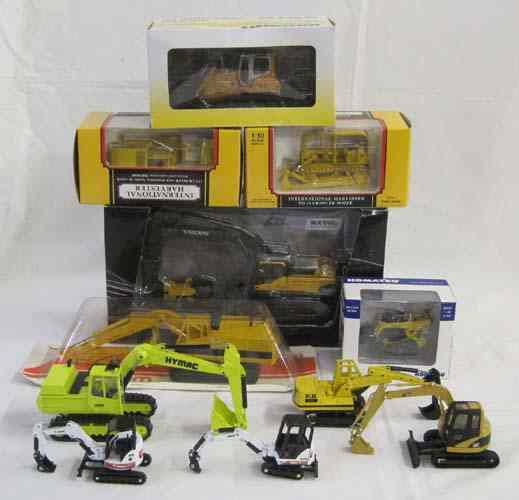 Appraisal: ELEVEN DIECAST METAL SCALE MODELS OF EARTH MOVING EQUIPMENT including