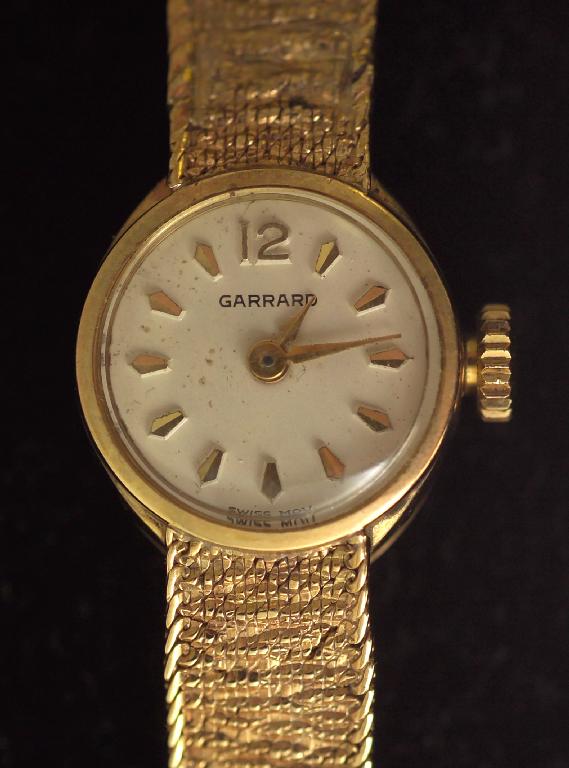 Appraisal: GARRARD LADY'S ct GOLD WRIST WATCH the dial with Arabic