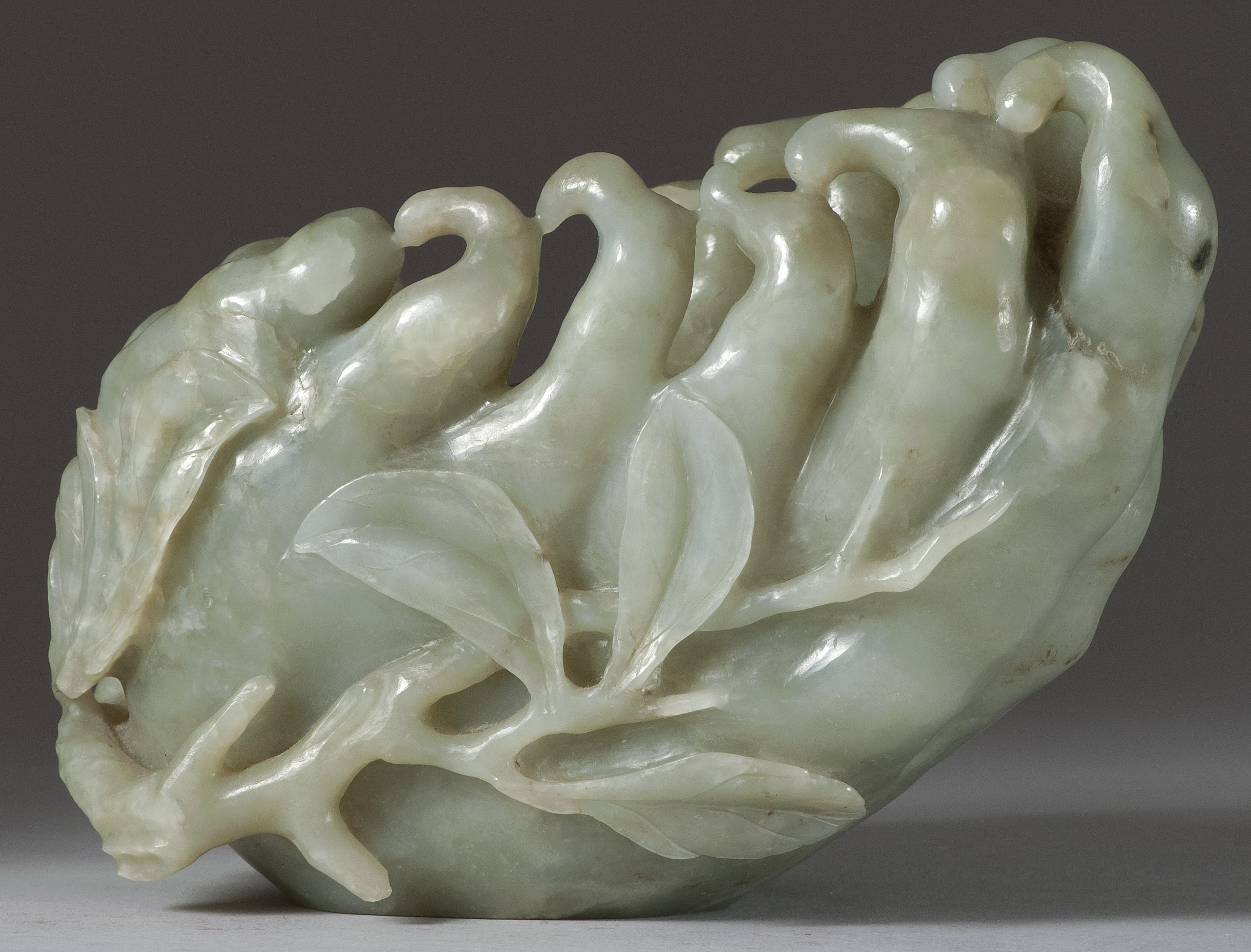 Appraisal: CELADON JADE BOWL th CenturyIn citron form with relief leaves