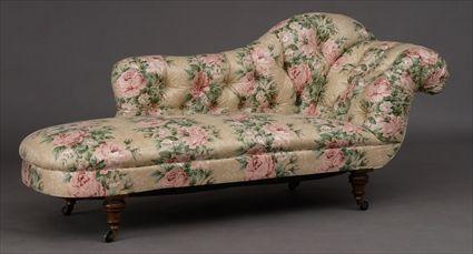 Appraisal: VICTORIAN WALNUT CHINTZ-UPHOLSTERED CHAISE LOUNGE On turned legs with casters