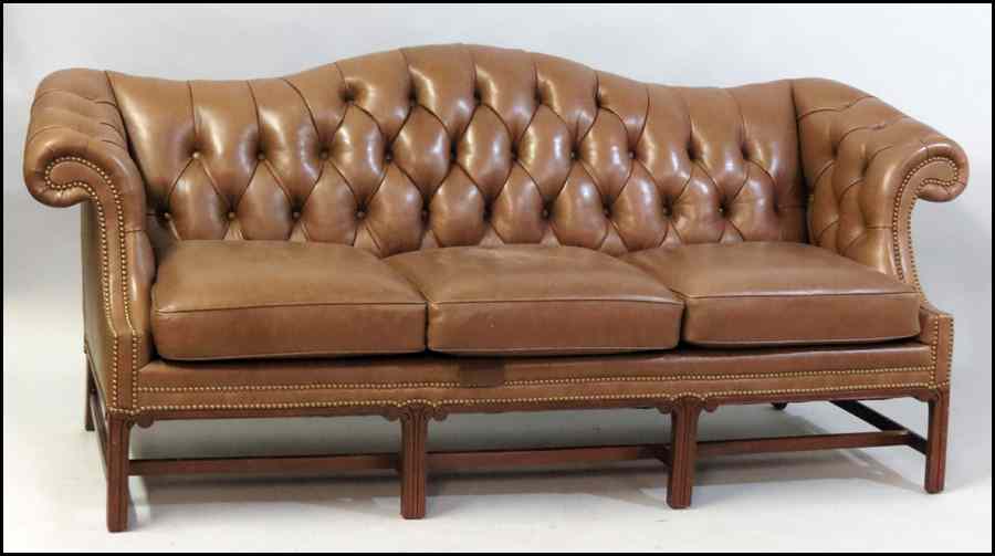 Appraisal: CABOT WRENN CAMELBACK THREE CUSHION LEATHER SOFA With nailhead trim