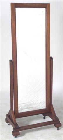 Appraisal: LATE VICTORIAN MAHOGANY CHEVAL MIRROR the simple rectangular frame raised