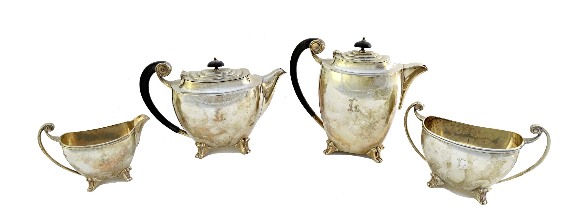 Appraisal: A silver four piece matched tea set comprising a teapot