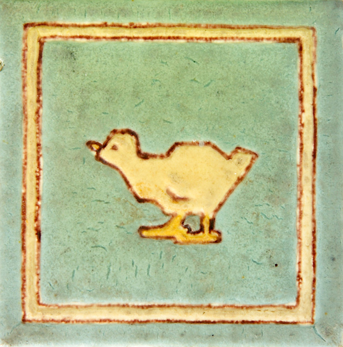 Appraisal: GRUEBY PARDEE tile decorated in cuerda seca with a yellow