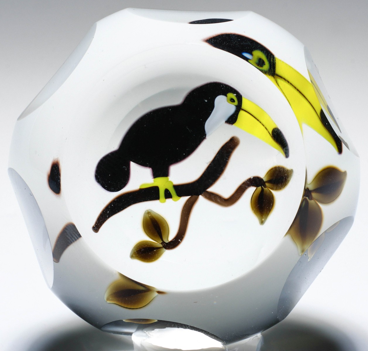 Appraisal: A PERTHSHIRE SIX FACETED PAPERWEIGHT WITH TOUCANThe Perthshire limited edition