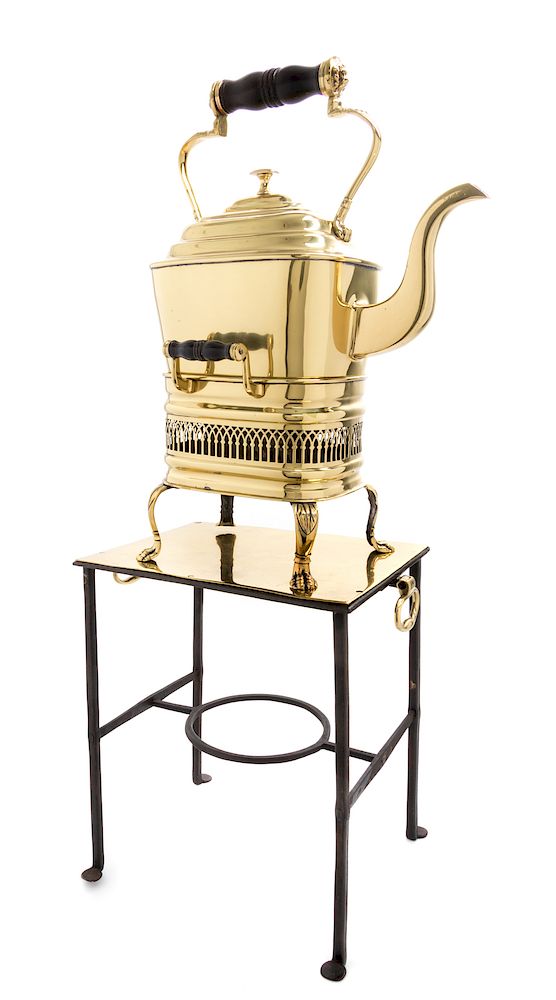 Appraisal: An English Brass Kettle-on-Stand An English Brass Kettle-on-Stand Height of