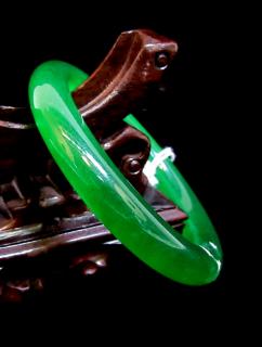 Appraisal: Green Jade Bangle Green Jade Bangle Excellent color and translucence