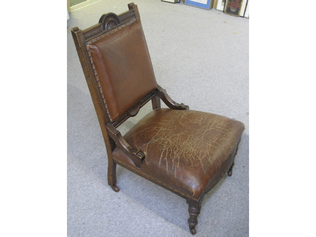 Appraisal: Victorian mahogany chair with leather seat and back