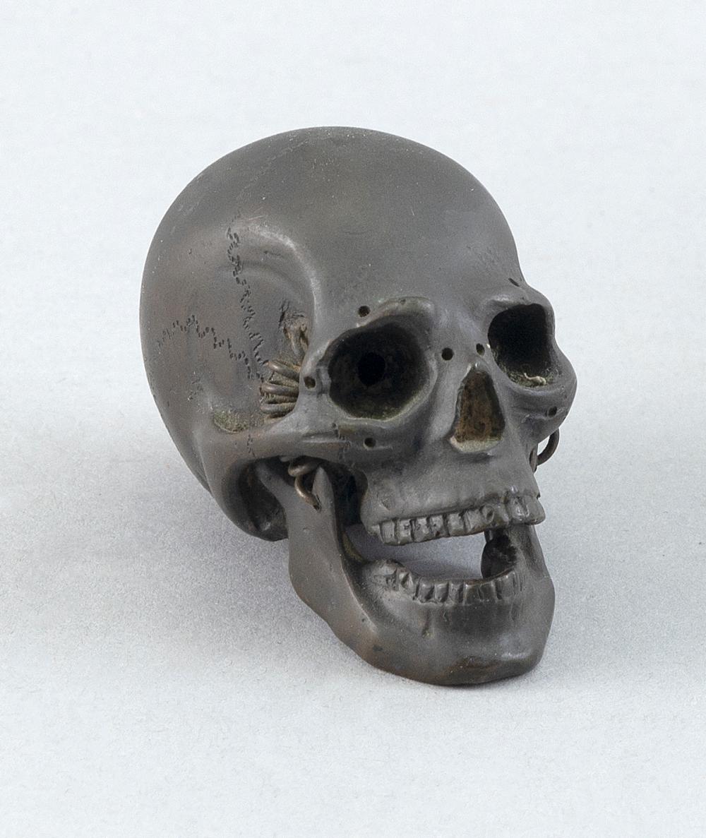 Appraisal: MINIATURE BRONZE SKULL EARLY TH CENTURY LENGTH MINIATURE BRONZE SKULL