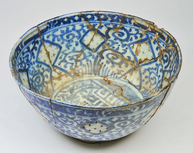 Appraisal: AN ANTIQUE PERSIAN POSSIBLY KASHAN BLUE AND WHITE GLAZED BOWL