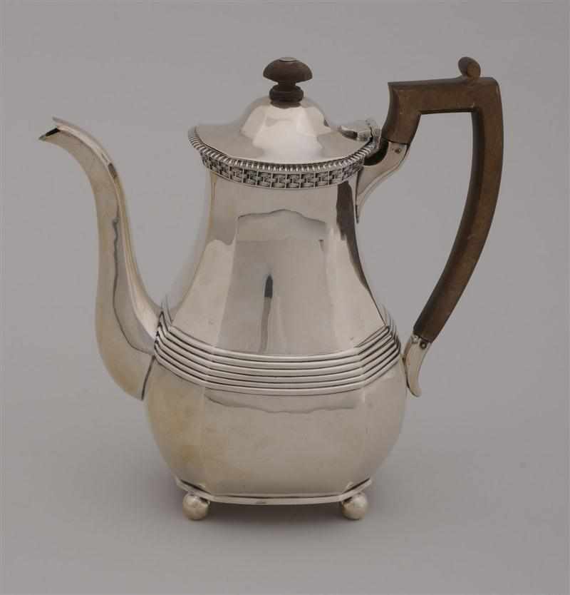 Appraisal: ENGLISH CRESTED SILVER COFFEE POT Heining Co Ltd London of