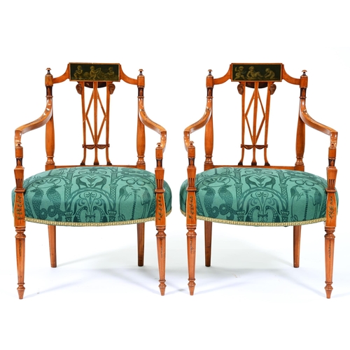 Appraisal: A pair of painted satinwood elbow chairs early th c