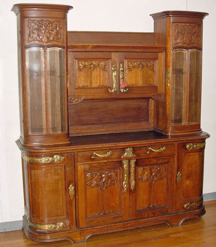 Appraisal: CONTINENTAL ART NOUVEAU OAK AND BRASS MOUNTED SIDEBOARD Exceptional detail