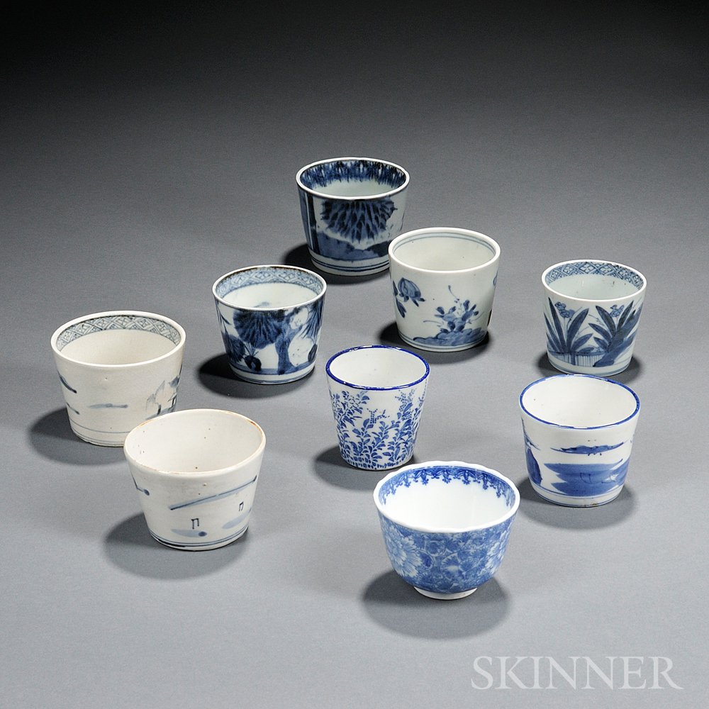 Appraisal: Nine Blue and White Cups Japan eight with straight sides