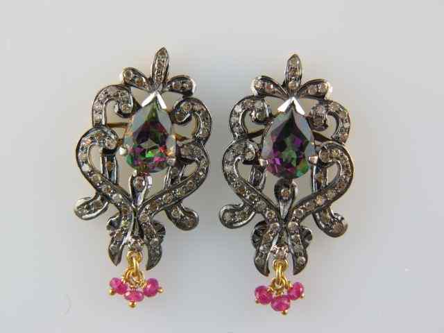 Appraisal: Diamond Ruby Mystic Topaz Earrings pear shaped gem surrounded by