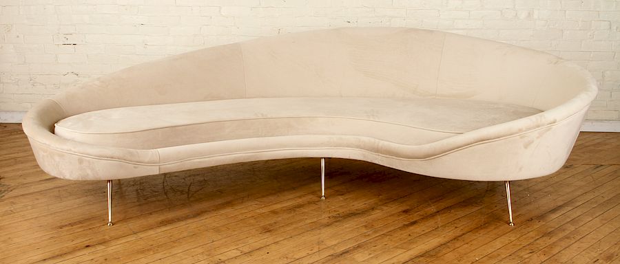 Appraisal: ITALIAN CURVED SOFA MANNER OF FEDERICO MUNARI A large Italian