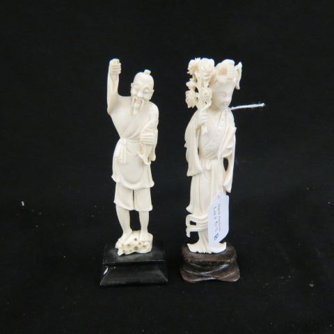 Appraisal: Chinese Carved Ivory Figurines goddess and old fisherman lacking fighing