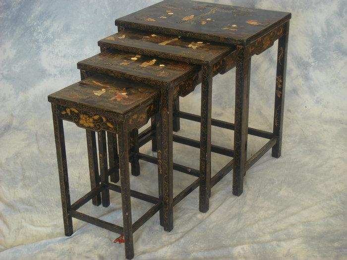 Appraisal: Nest of four black lacquer decorated Chinese tables each mounted