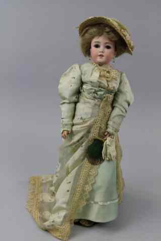 Appraisal: SIMON HALBIG EDWARDIAN ERA LADY DOLL Narrow faced doll incised