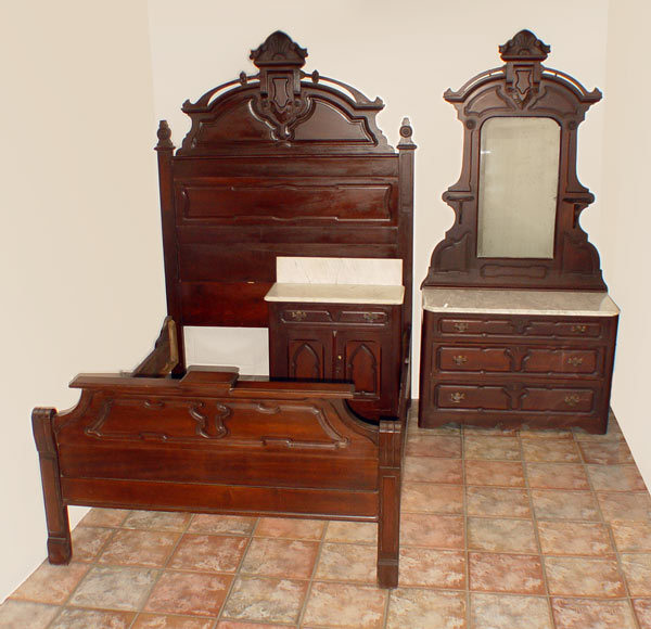 Appraisal: PIECE VICTORIAN ROCOCO REVIVAL BEDROOM SET Heavily carved crest with