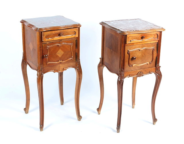 Appraisal: A PAIR OF FRENCH BEECHWOOD BEDSIDE CABINETS with rouge marble