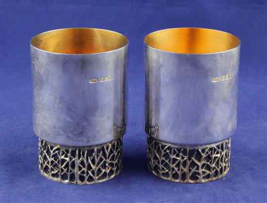 Appraisal: A stylish modern pair of Scottish silver beakers by Christopher