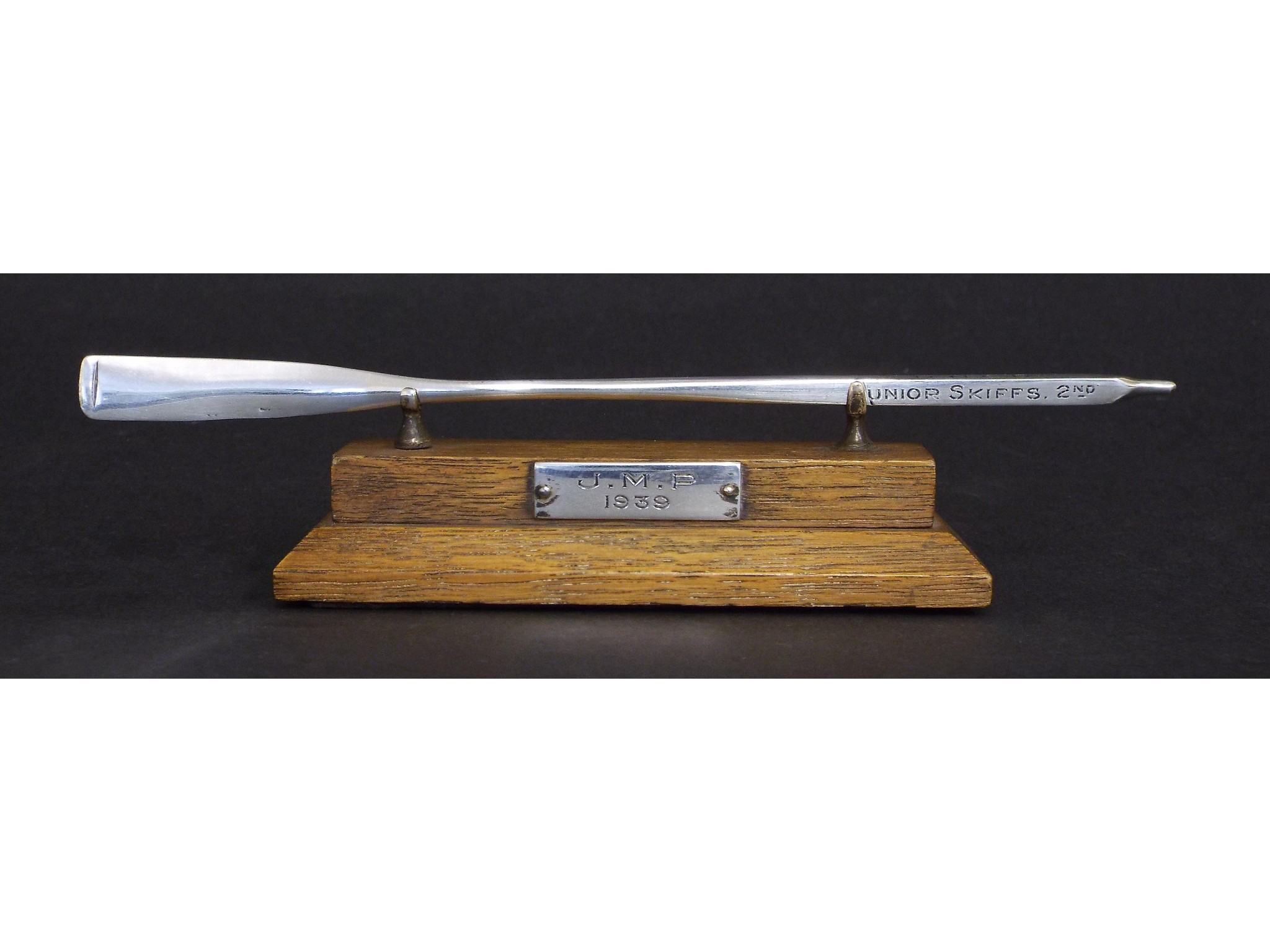 Appraisal: s silver presentation trophy in the form of a rowing