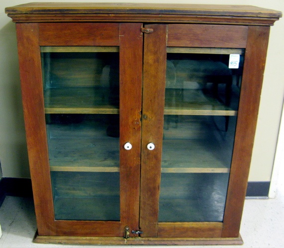 Appraisal: COUNTRY KITCHEN COUNTER-TOP CABINET American c having three interior shelves