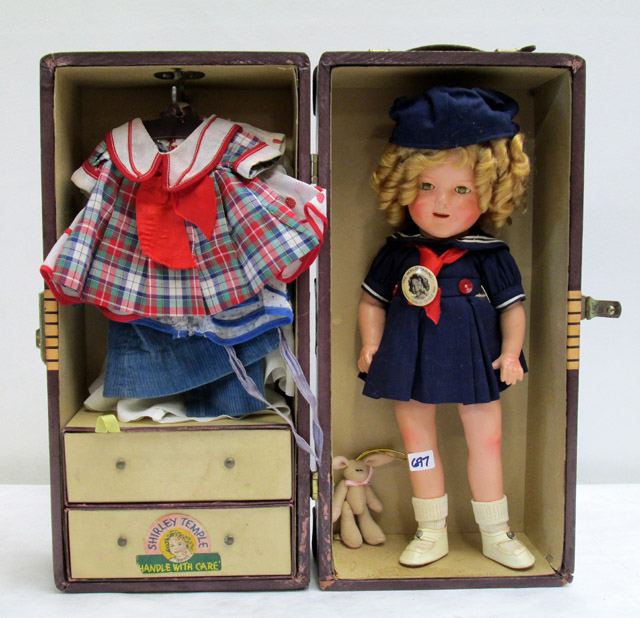 Appraisal: SHIRLEY TEMPLE DOLL WITH STEAMER TRUNK and accessories Ideal Toy