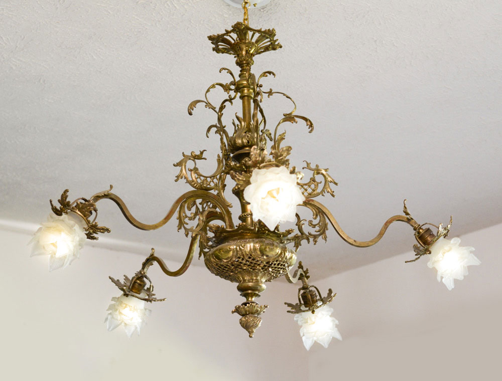 Appraisal: LIGHT BRASS ROCOCO CHANDELIER Rococo style frame with foliate and