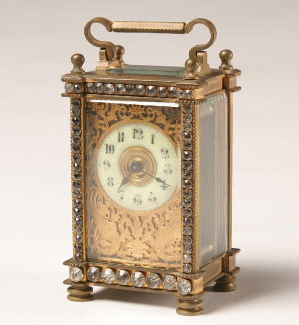 Appraisal: Brass carriage clock crystal studded painted face set in filigreed