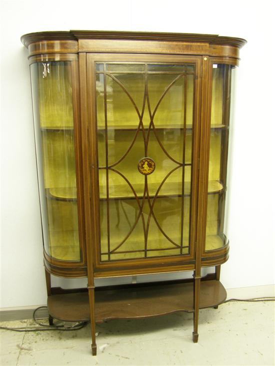 Appraisal: Early twentieth century mahogany display cabinet the break front with