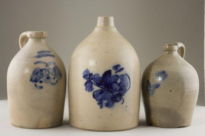 Appraisal: Three th Century Stoneware Jugs all with brushed cobalt floral