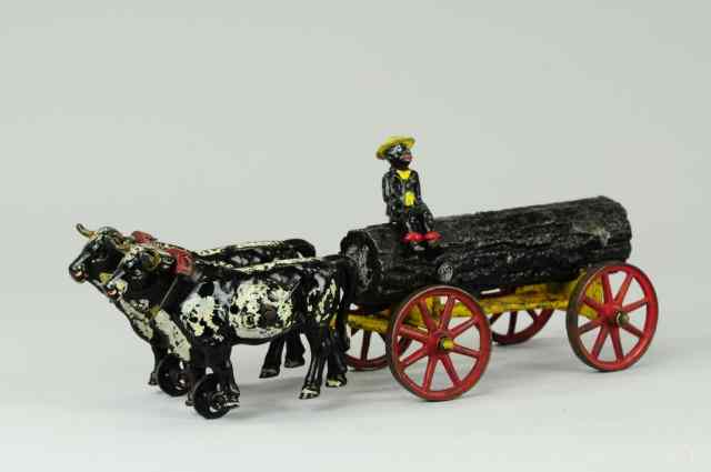 Appraisal: a OXEN DRAWN LOG WAGON Hubley cast iron well detailed