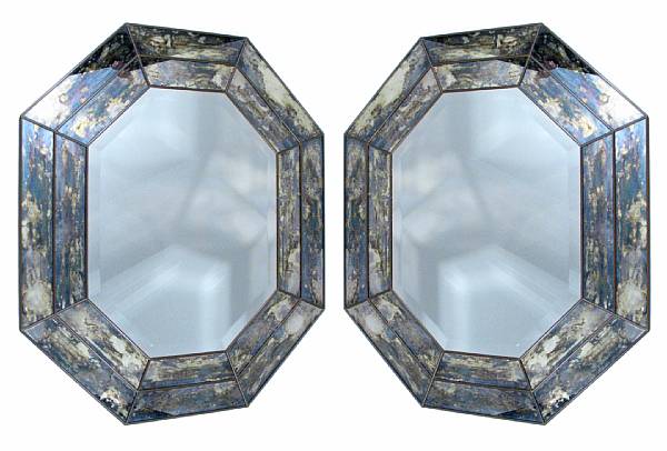 Appraisal: A pair of Venetian style octagonal mirrors height in width