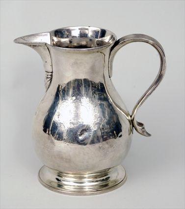 Appraisal: Irish George III Silver Armorial Beer Jug Marks rubbed Dublin