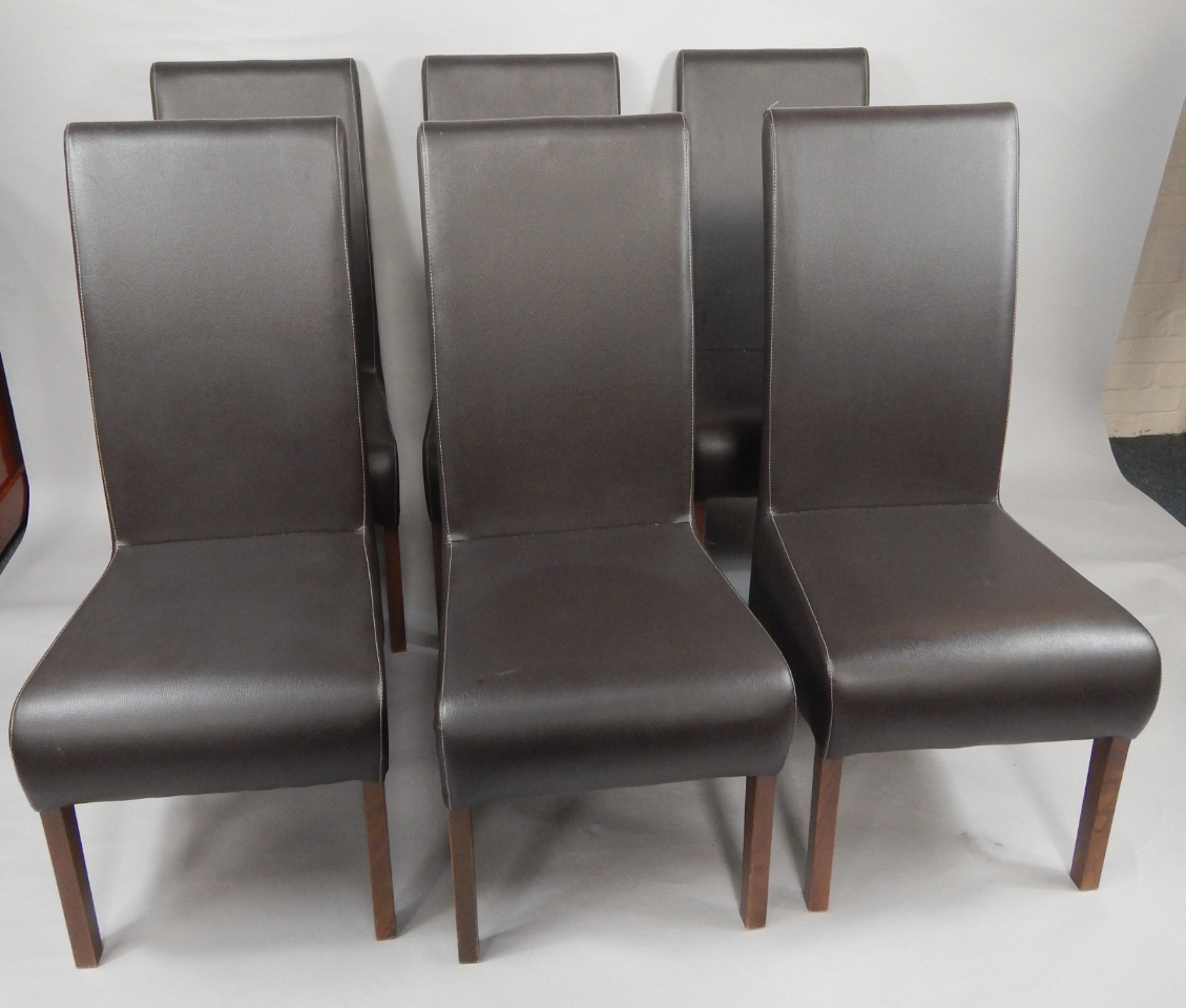 Appraisal: A set of six mahogany single dining chairs with overstuffed