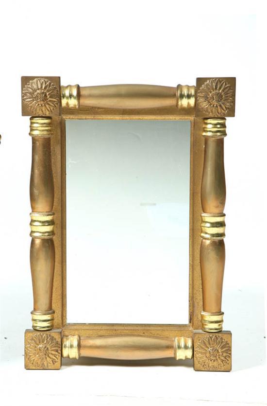 Appraisal: MIRROR Gilt mirror with turned columns and corner rosettes h